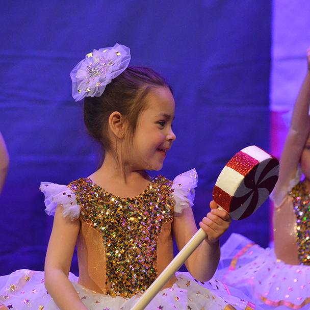 Little girl performing in The Nutcracker